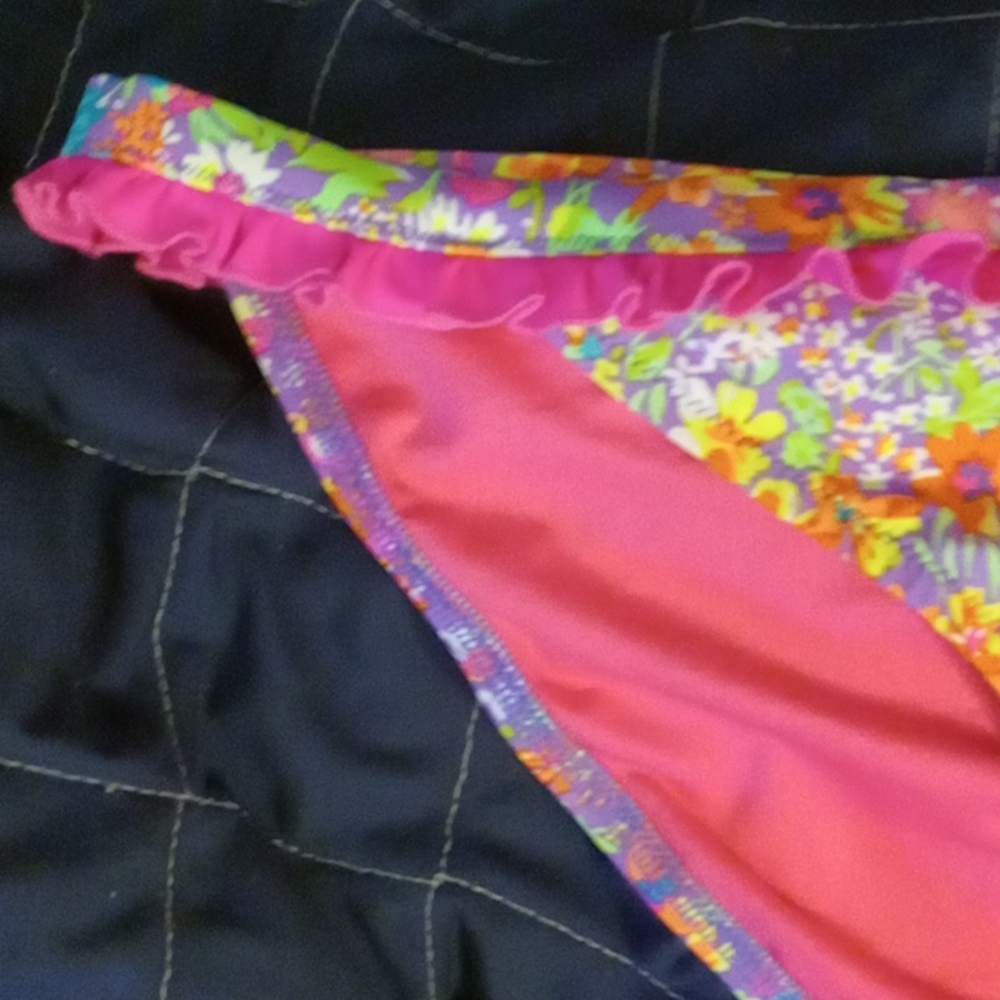 Bright pink frilly and Floral Victoria's Secret bathing suit bottom